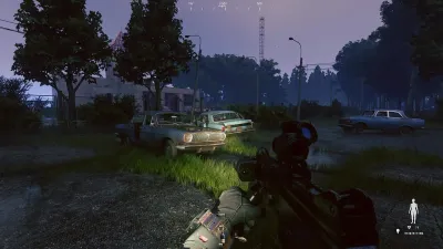 An armoured vehicle parked on a forest road while a player watches the treeline